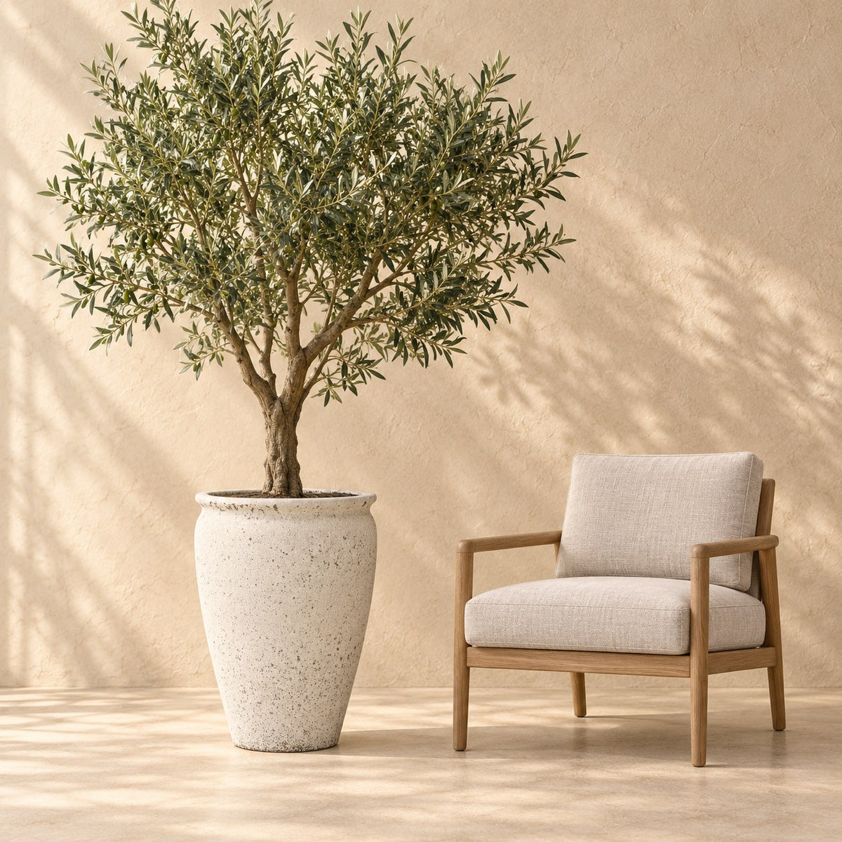 Decorative pot Artemis Ø53 x H68 cm, at true scale next to an armchair